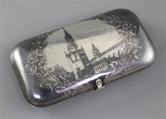 A 19th century Russian silver and niello work cheroot case, decorated with the Kremlin Spasskaya Clock Tower, gross 6 oz.